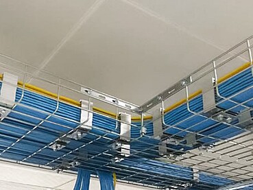 Powder-Coated Cable Trays vs. Pre-Galvanized Trays in Dubai Indoor Parking Structures: A Moisture and Chloride Exposure Analysis